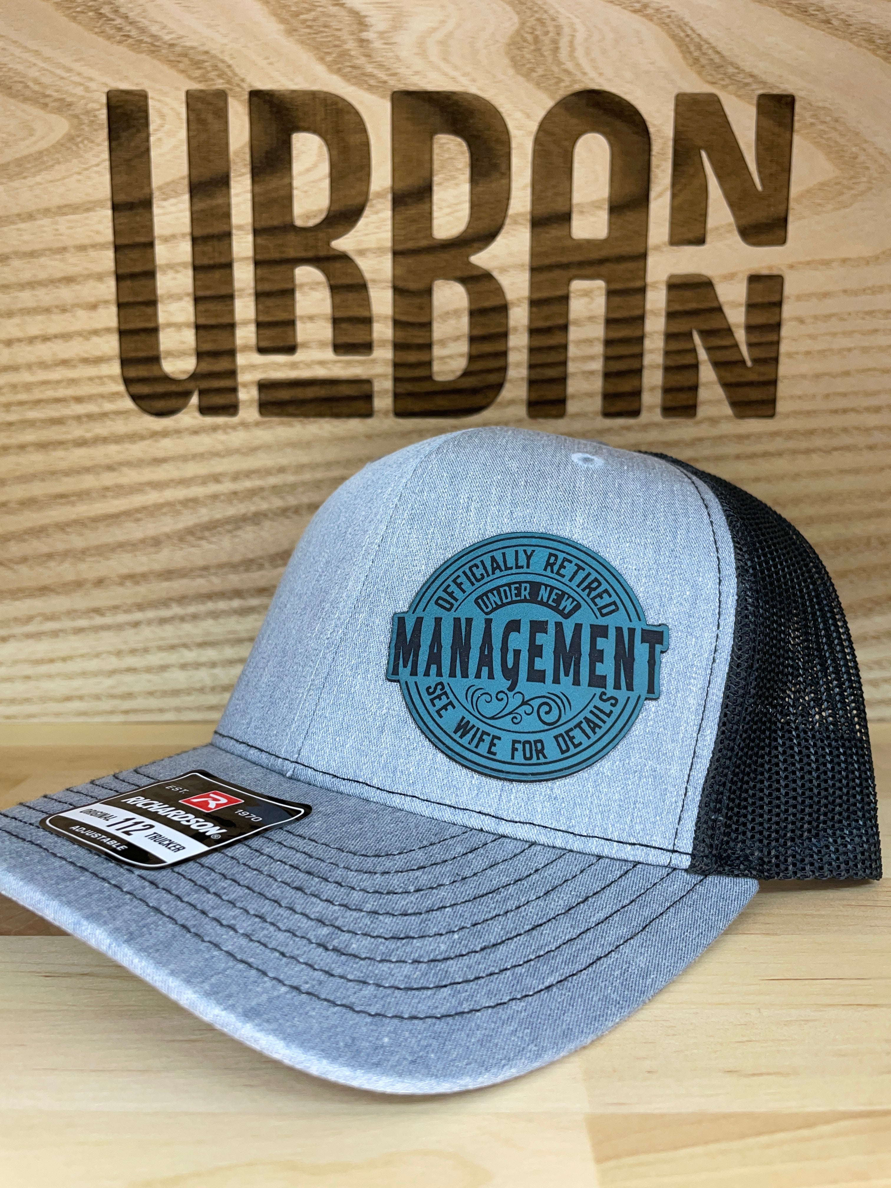 Under New Management Hat
